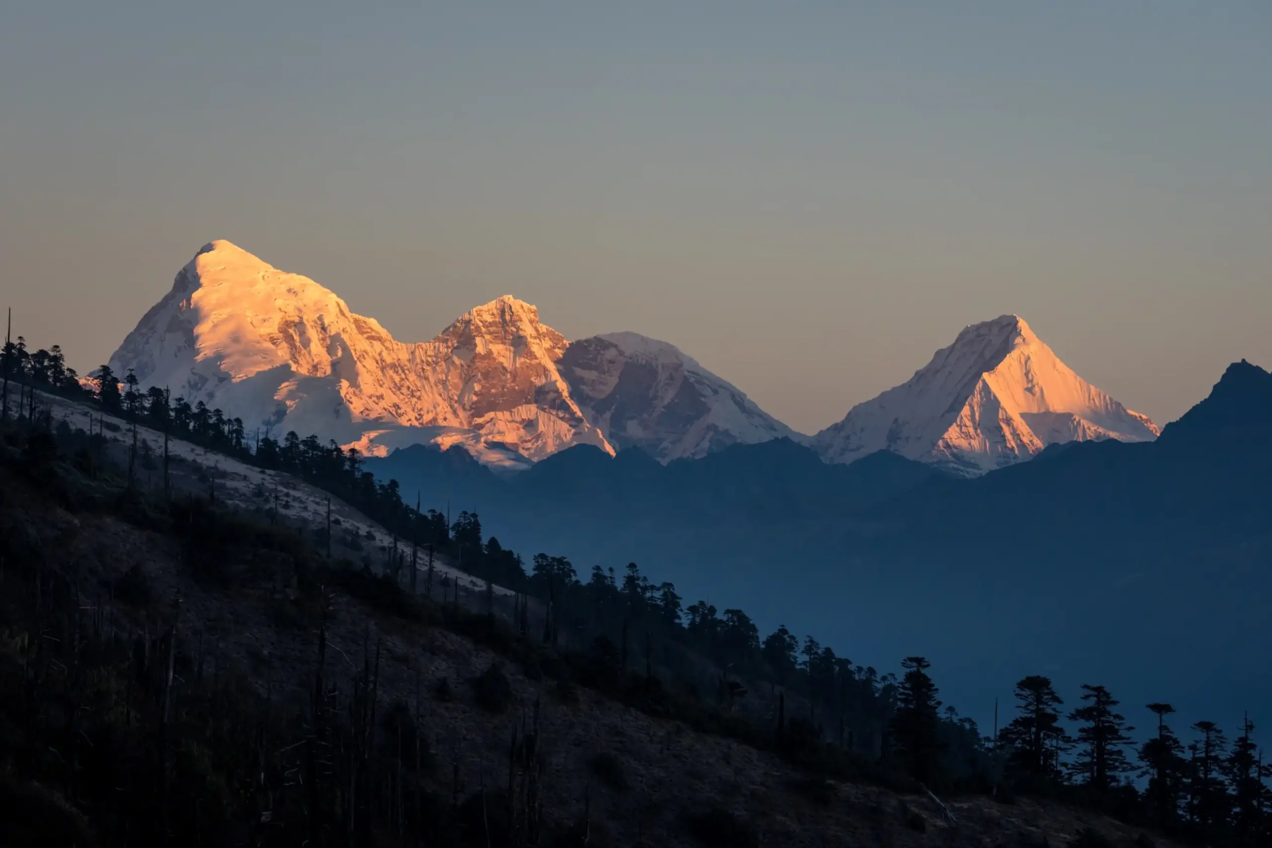 Yoga overlooking the Himalayas. Transformative Wellness Experiences in Bhutan. Credit: Marcus Westberg