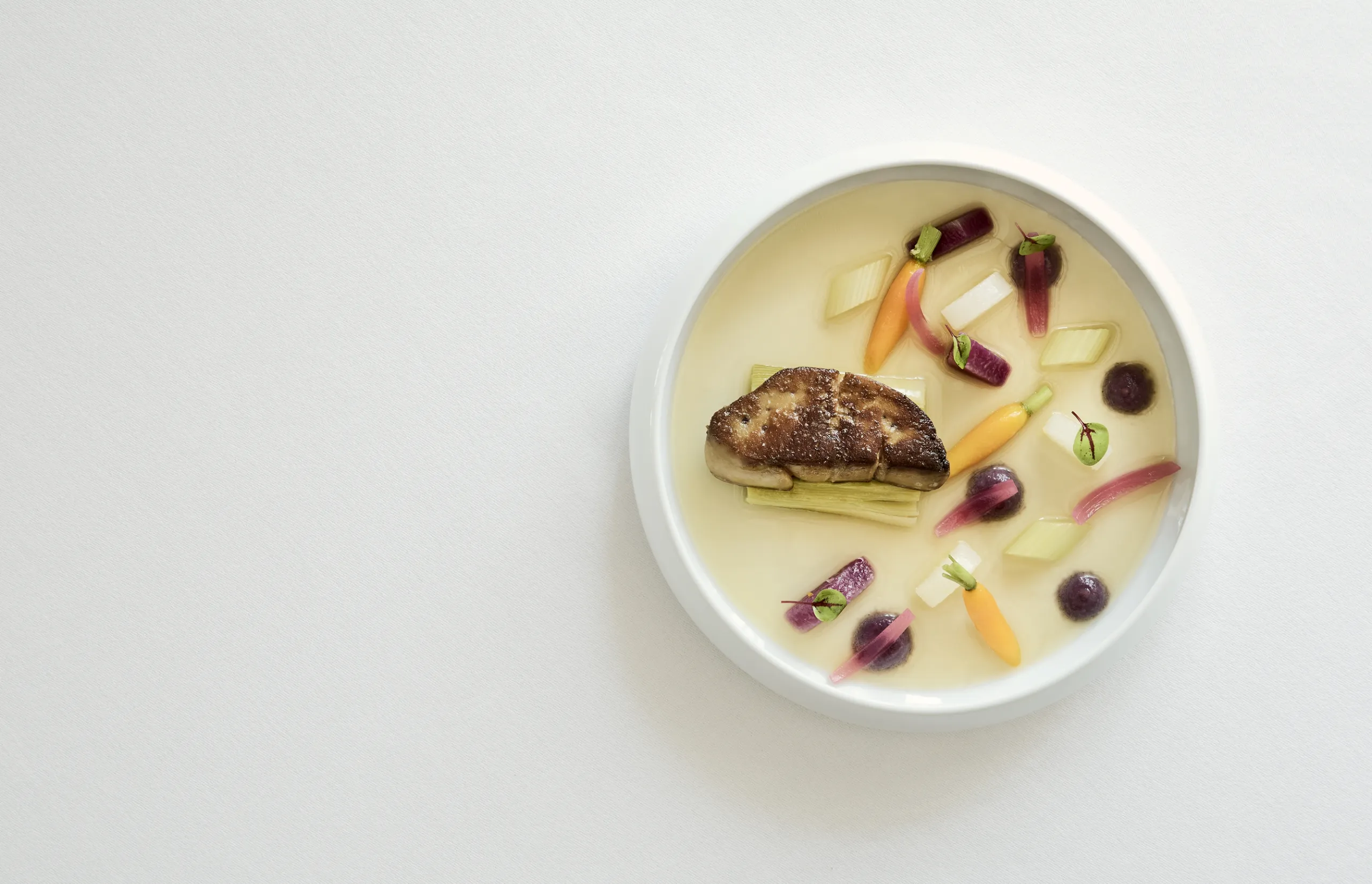 COMO Le Montrachet - Pan-fried duck foie gras, vegetables from a pot-au-feu, strong broth