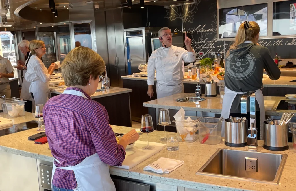 Chef John Stephano teaches a class in Grandeur’s Culinary Arts Kitchen | Credit: John Nowlan | Regent Seven Seas Grandeur