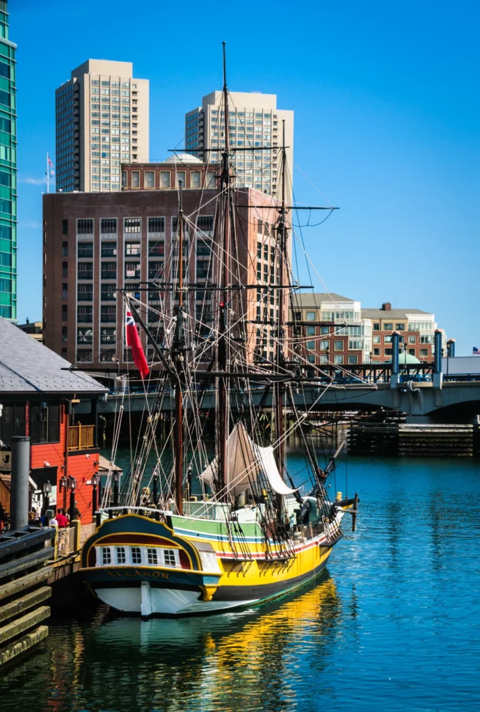 Boston | A group of tourists walk along Griffin's Wharf as they prepare to tour the "Eleanor". The ship is a replica of the original ship, which while docked here on December 16, 1773 was boarded by a group of men dressed as Indians who tossed 114 crates of British East India Company tea into the harbor in protest of the Tea Tax. This has come to be known as the Boston Tea Party.