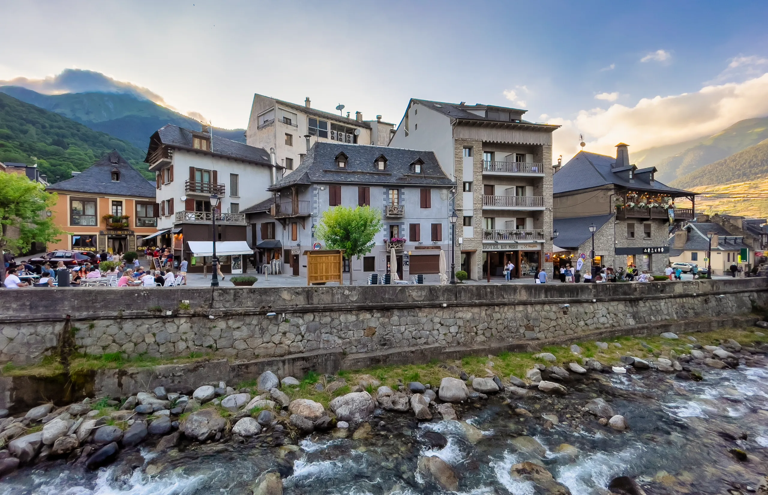 Grand Tour of Catalonia | Vielha and Mijaran, Catalonia, Spain, 07/18/2021; Garonne River as it passes through Vielha, tourist area, Editorial.