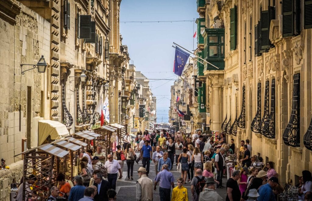 Passengers strolling on Merchants Street, Valletta, Malta