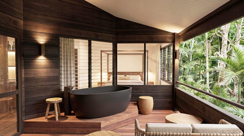 Ever Bloomfield cabin exterior deck with freestanding bath and louvred windows to rainforest, Daintree Coast