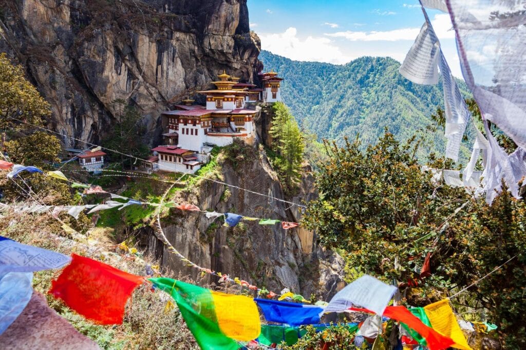 Paro Taktsang, also known as the Tiger's Nest Monastery, perched dramatically on a cliffside in Bhutan