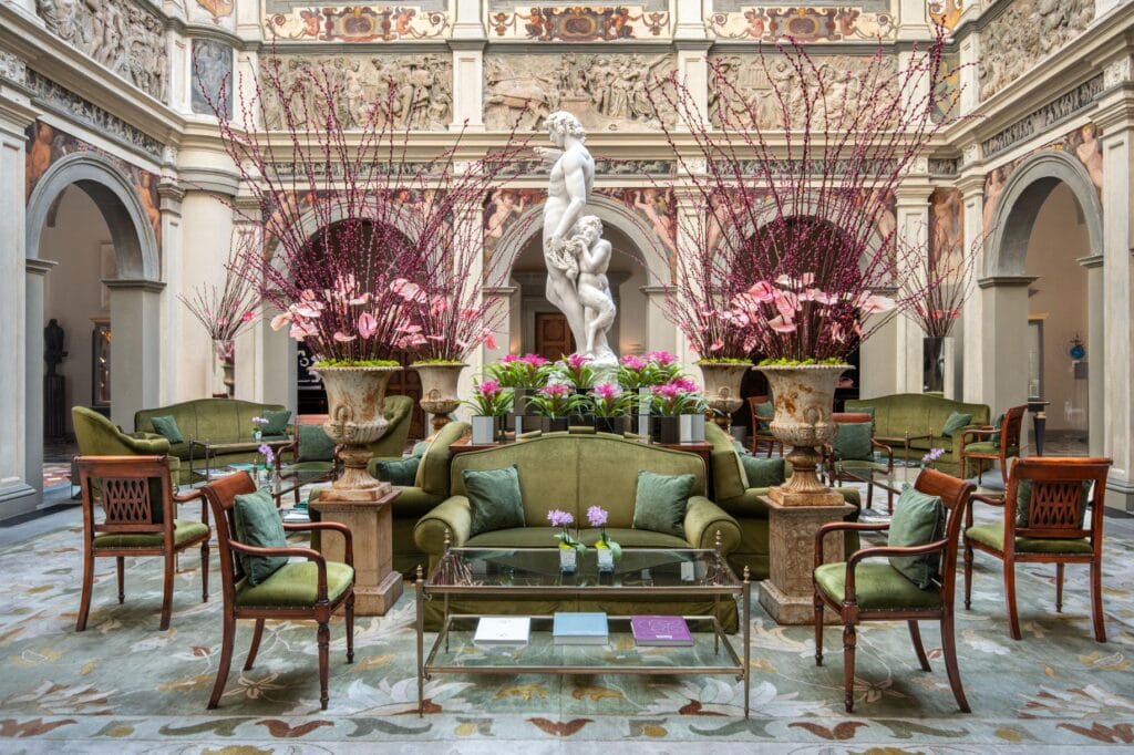 Four Seasons Hotel Firenze lobby, featuring classical sculptures and ornate Renaissance, Credit: Peter Vitale