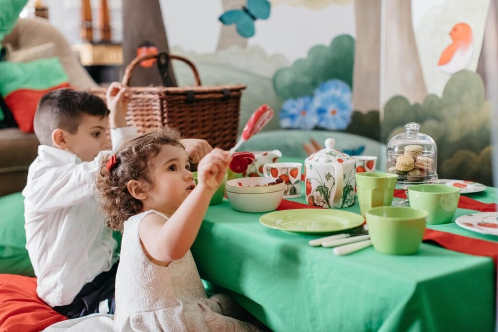 Children enjoying a tea party at St. Regis Florence