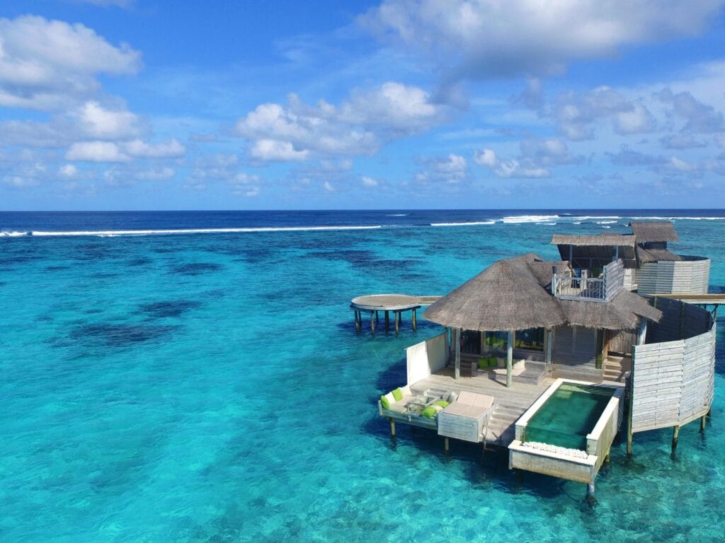 Sunset Laamu Water Villa with a private pool at the Six Senses Laamu