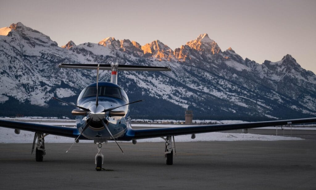 “Day with Wolves” — a private winter charter by Four Seasons Resort Jackson Hole, featuring an eight-passenger Pilatus flight over the Grand Tetons to Yellowstone’s northern frontier