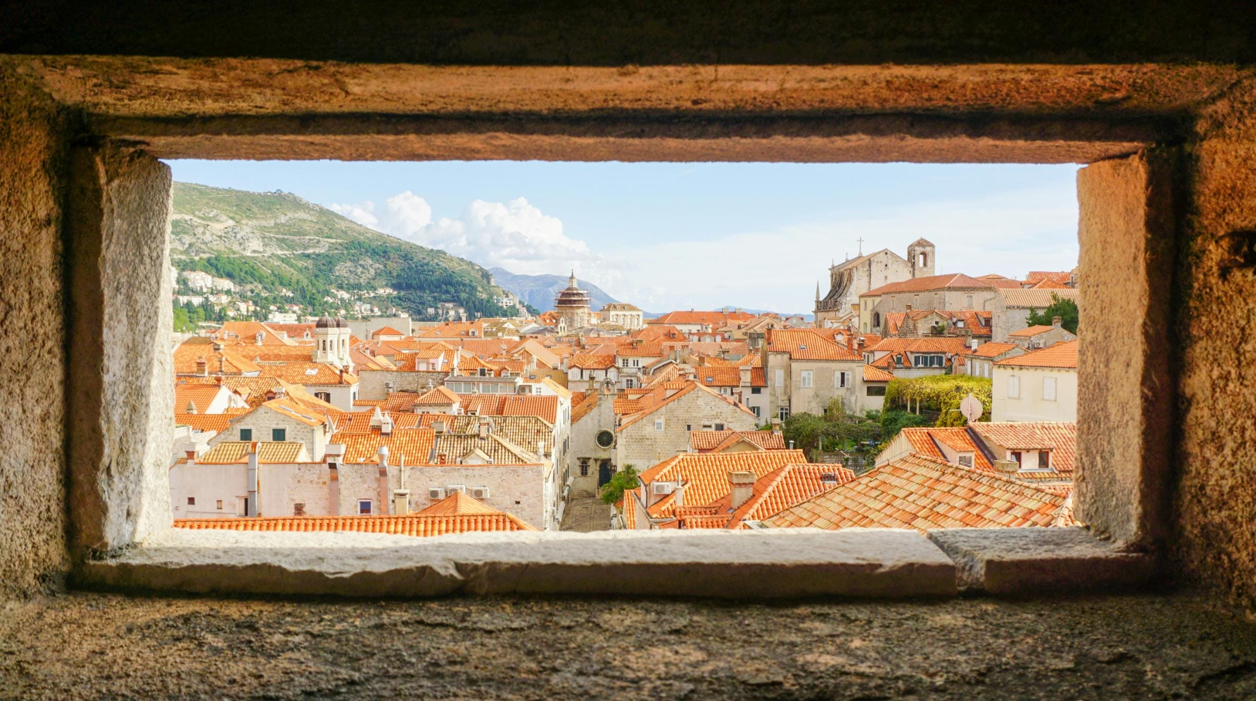 terracotta-roofed Old Town of Dubrovnik, Croatia. Image credit: Arber Pacara