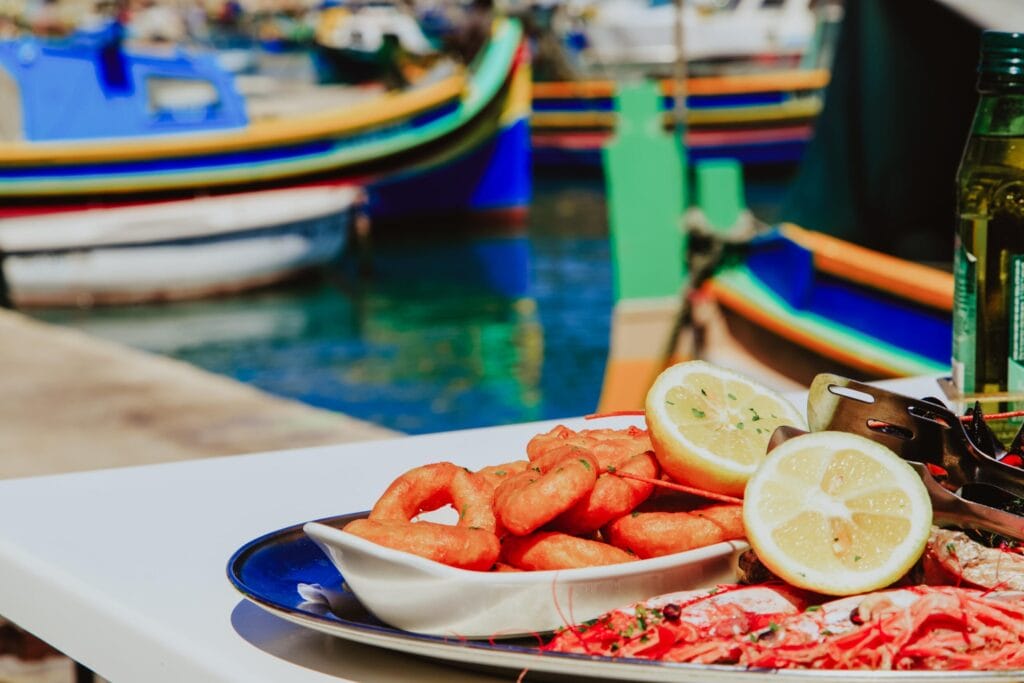 A vibrant platter of fresh fish, served in a Mediterranean restaurant in Malta.