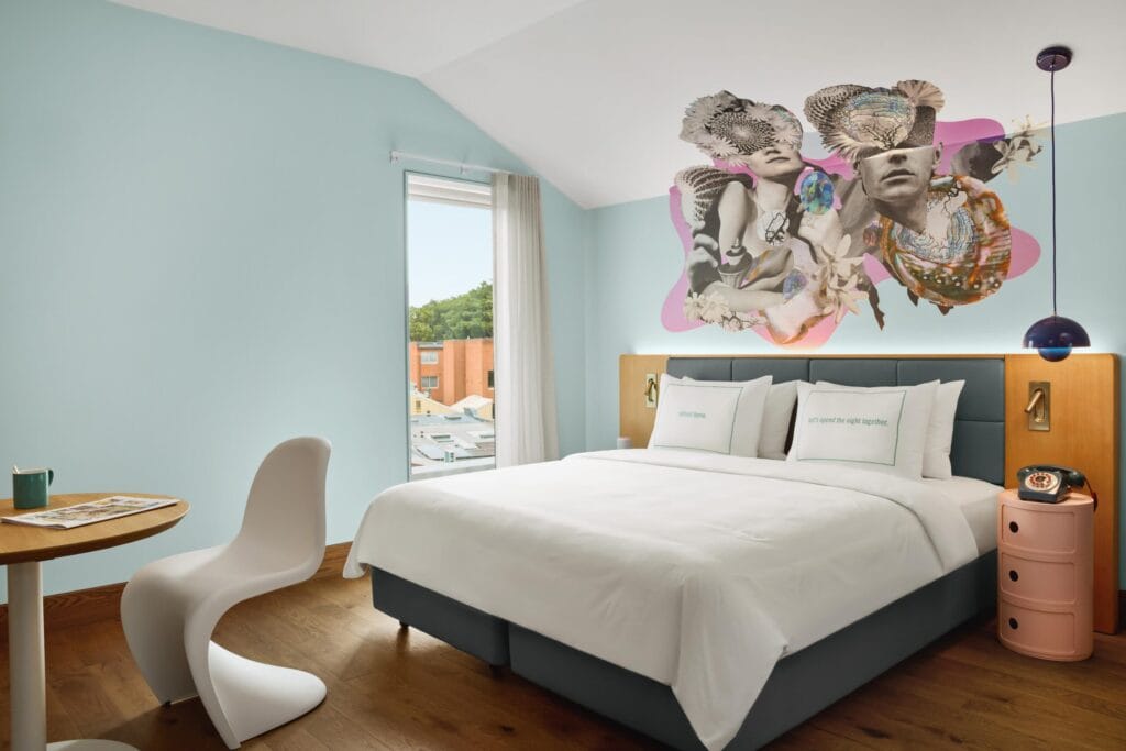 Guest room at the 25hours Hotel Sydney The Olympia. Photo credit: Justin Nicholas
