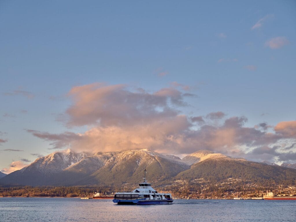 TransLink SeaBus passenger ferry crossing Burrard Inlet in Vancouver