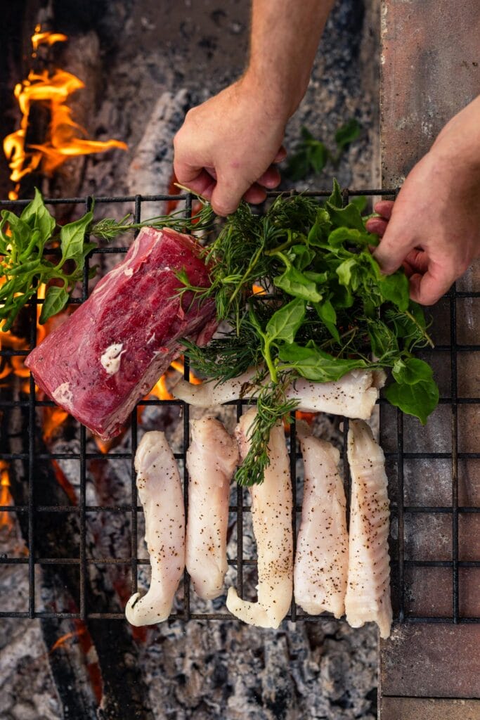 Cooking wild flavors over an open flame at Bamurru Plains
