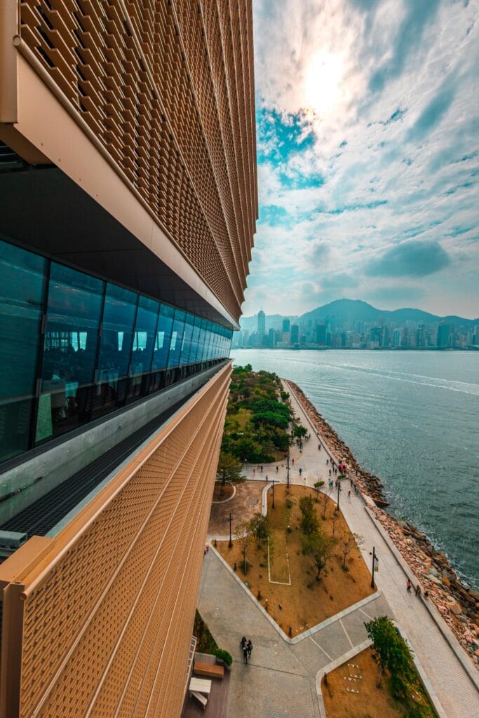 grand atrium and striking staircase inside the Hong Kong Palace Museum in the West Kowloon Cultural District
