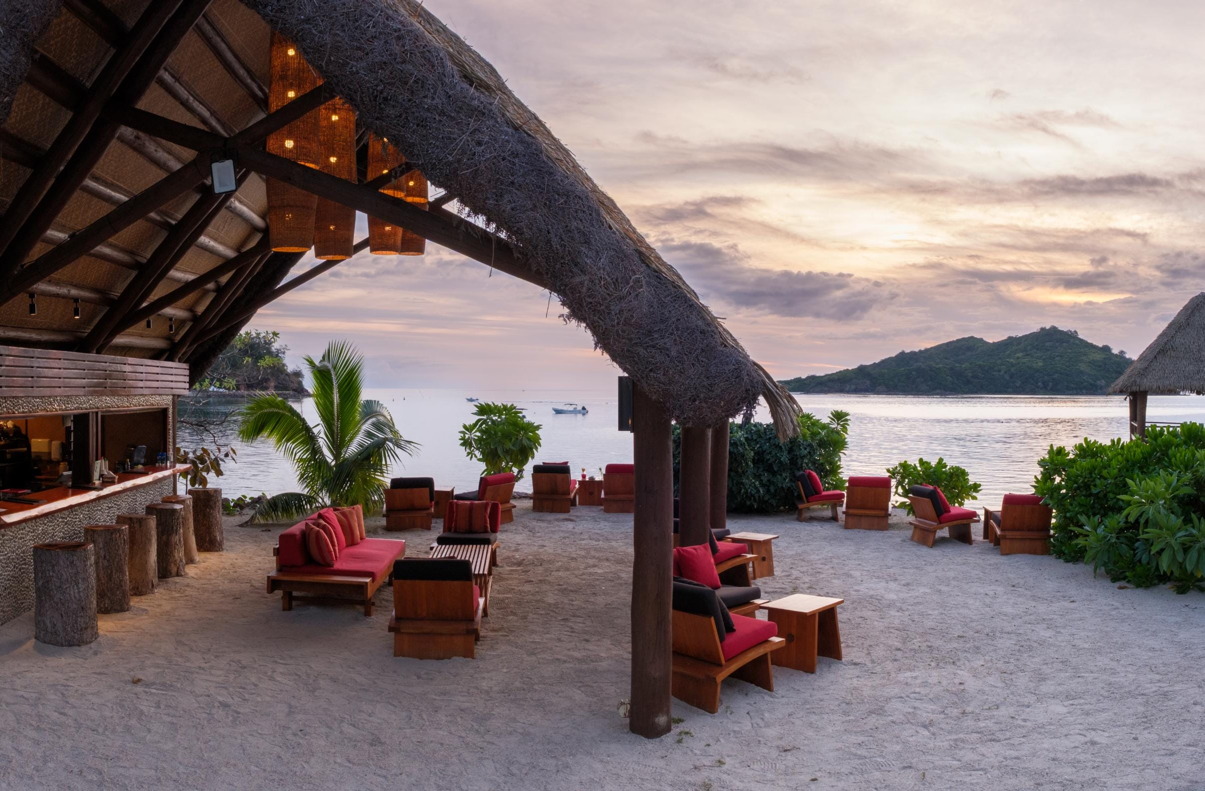 Open-air Masima Bar set on the white sand beach
