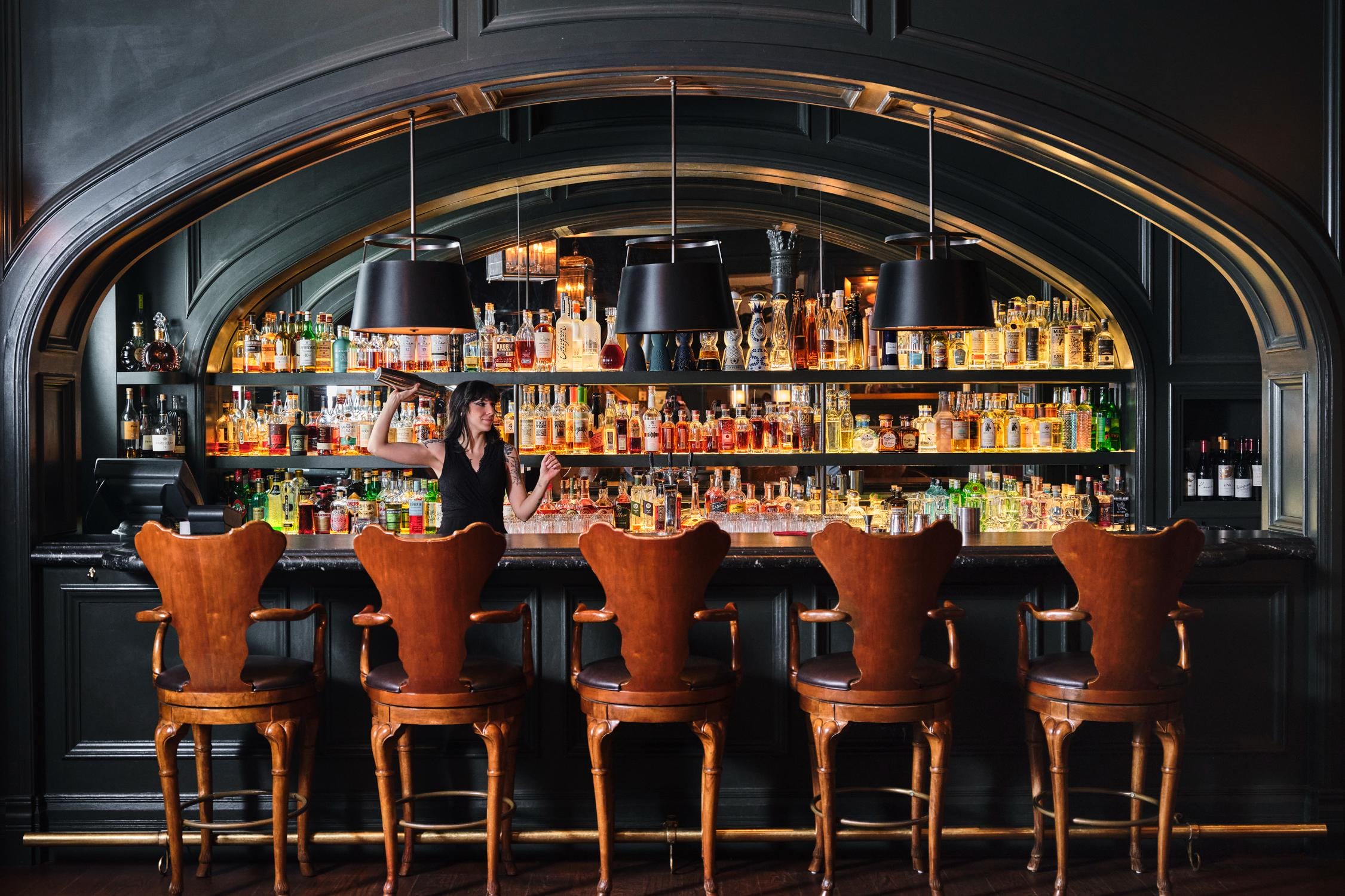 A bar inside The Living Room at the historic Hotel Jerome