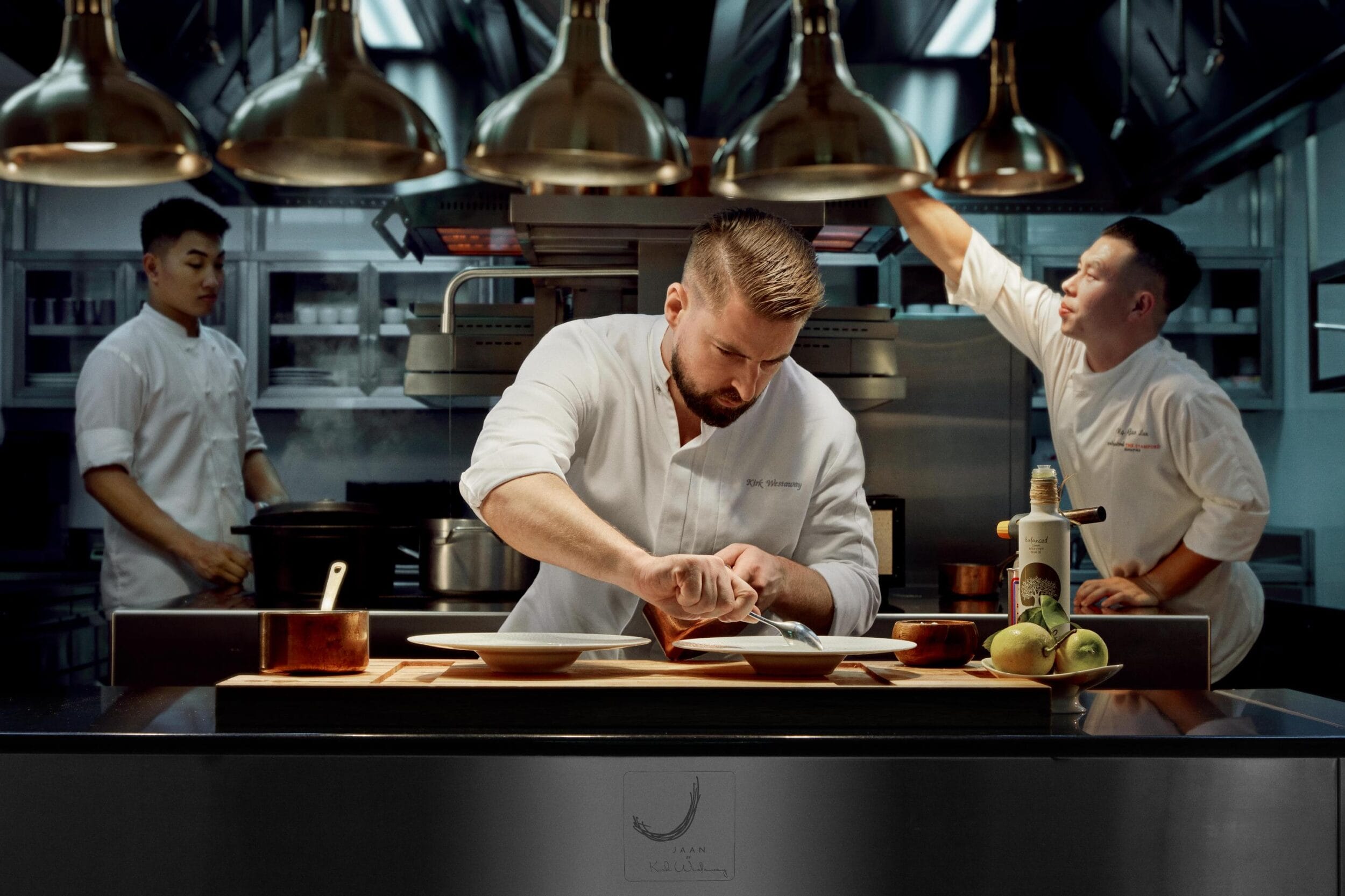 British chef Kirk Westaway plating a dish in the kitchen