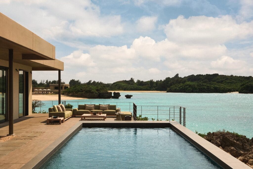 Infinity pool and outdoor lounge area of the Kamii House at the Rosewood Miyakojima resort in Okinawa